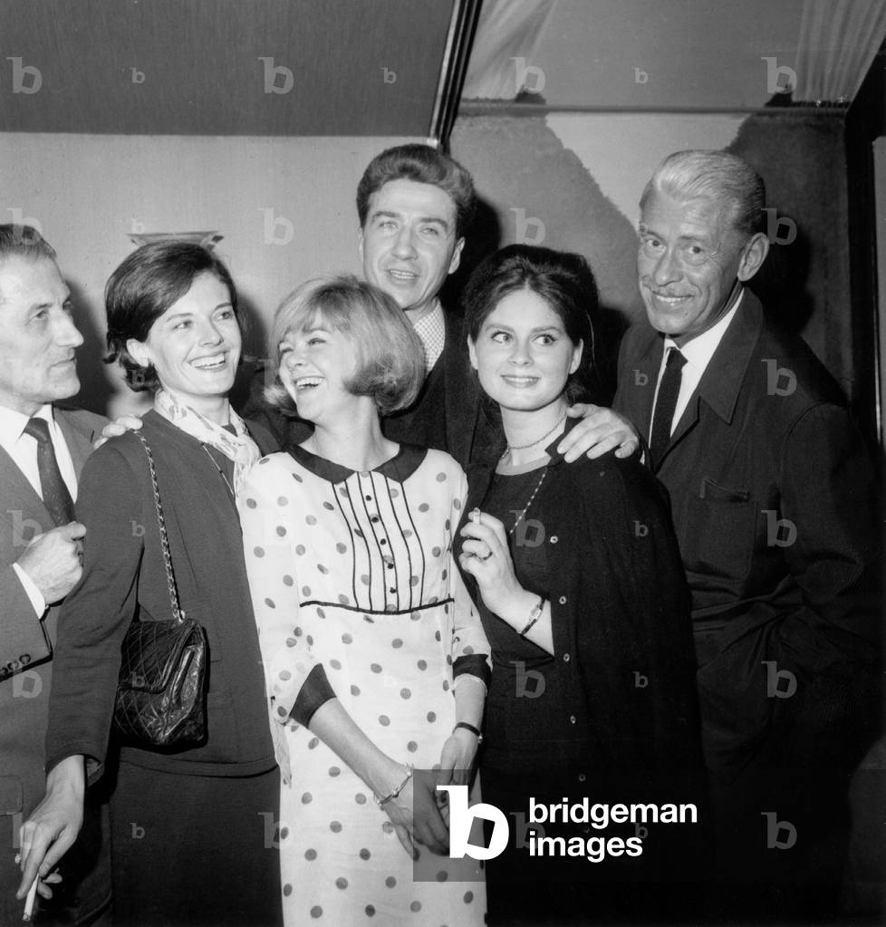 Film Director Alain Resnais Received International Film Critic Prize For his Film Muriel : here in The Background With Members of The Jury Jean Champion, Delphine Seyrig, Laurence Badie, Nita Klein and Jean Pierre Kerien, in Paris September 19, 1963 (b/w photo)