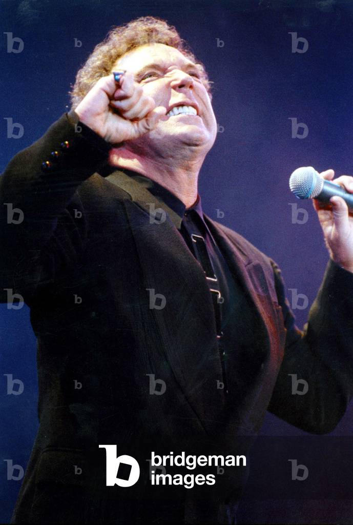Singer Tom Jones on Stage in 1987. (photo)
