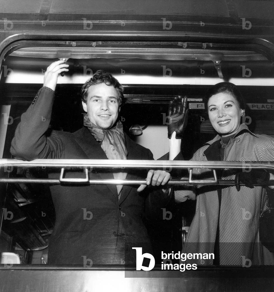 Marlon Brando and Rakia Ibrahim Leaving For New York September 24, 1953 (b/w photo)