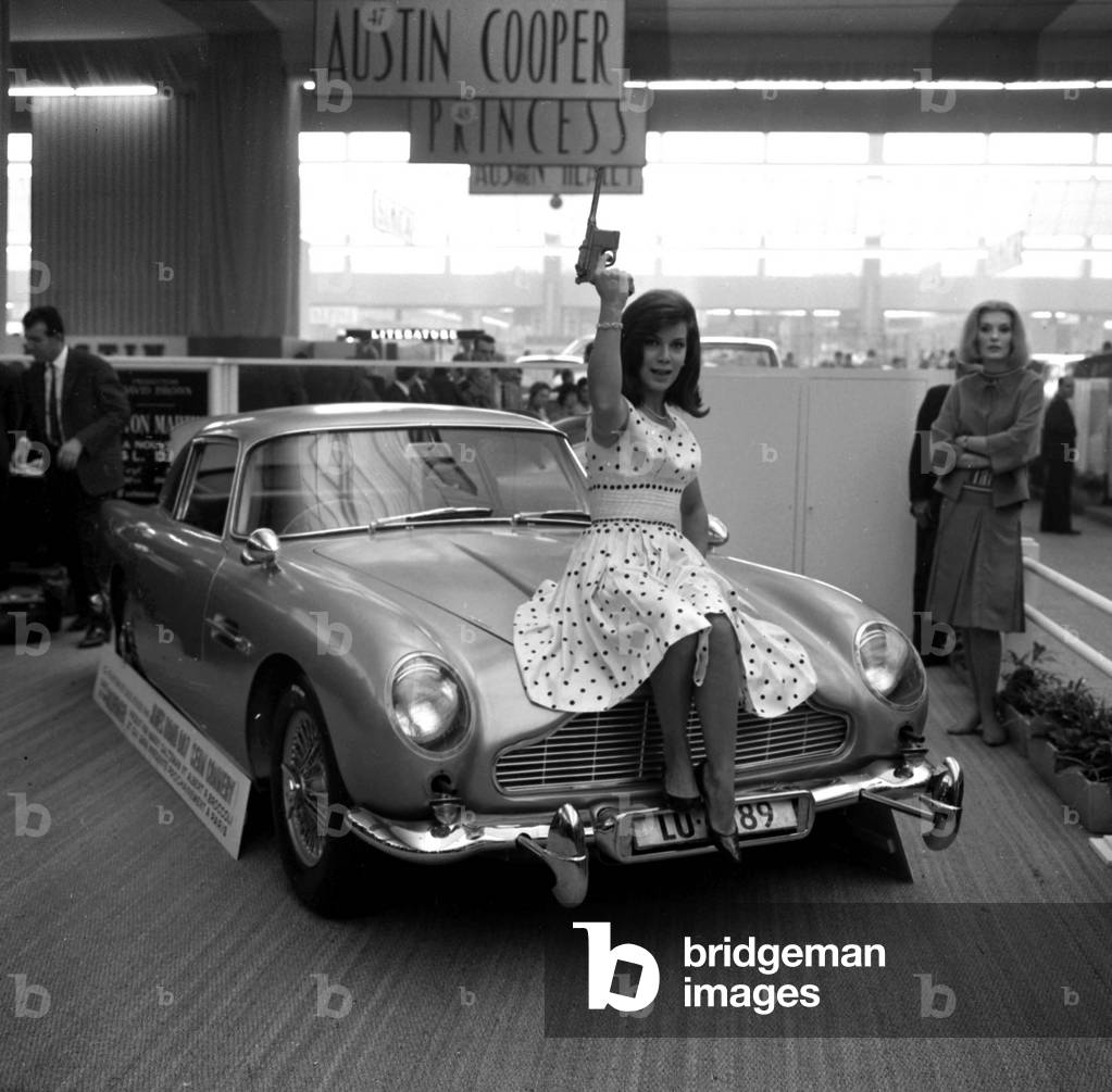 Paris Motor Show on October 1St, 1964 : French Actress Noelle Noblecourt and Aston Martin Db5 (Model Used in Goldfinger) (b/w photo)