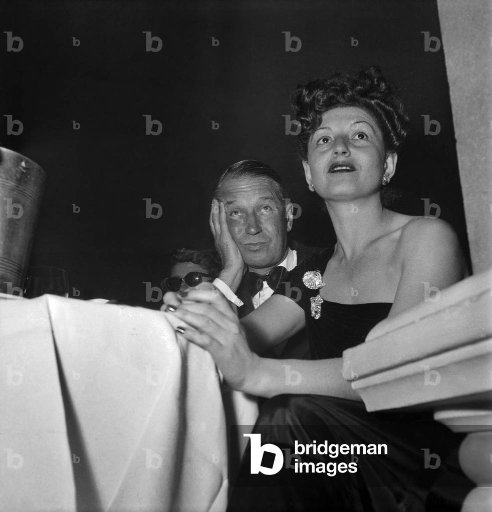 Maurice Chevalier and Rita Raya Attending Graciefields' Concert in Paris, October 30, 1948 (b/w photo)