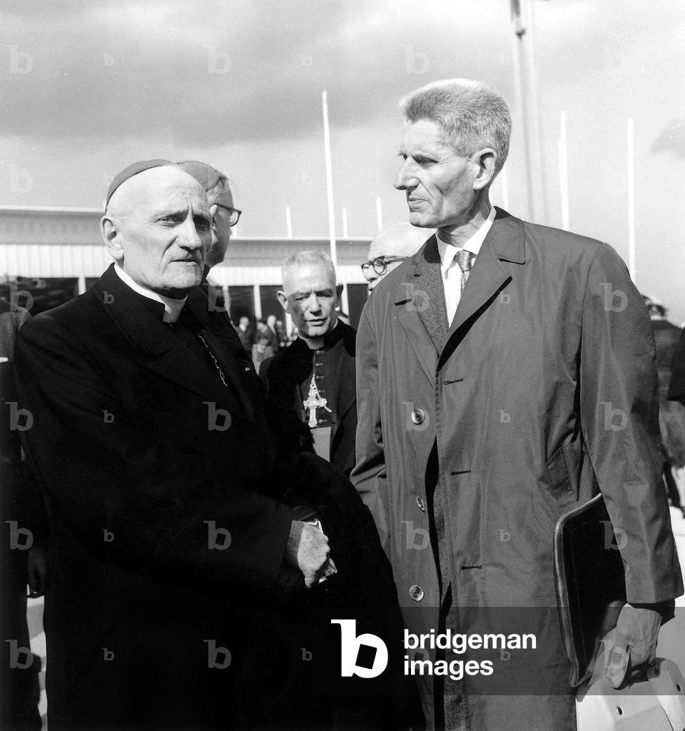 French Archbishop in Paris Airport Before Departure For Rome For The Oecumenical Council September 27, 1963 (b/w photo)