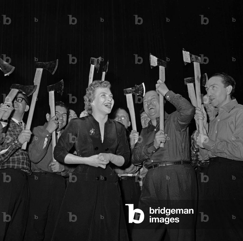 Line Renaud attending the Chansonniers' Gala in Parisian music hall Folies Bergere, on April 24, 1954