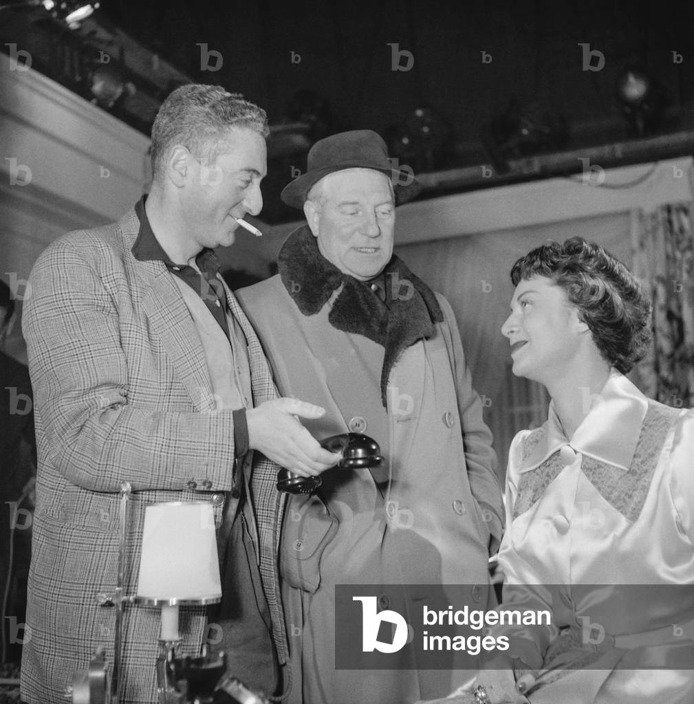 French director Claude Heymann, Jean Gabin and Francoise Christophe on set of film 