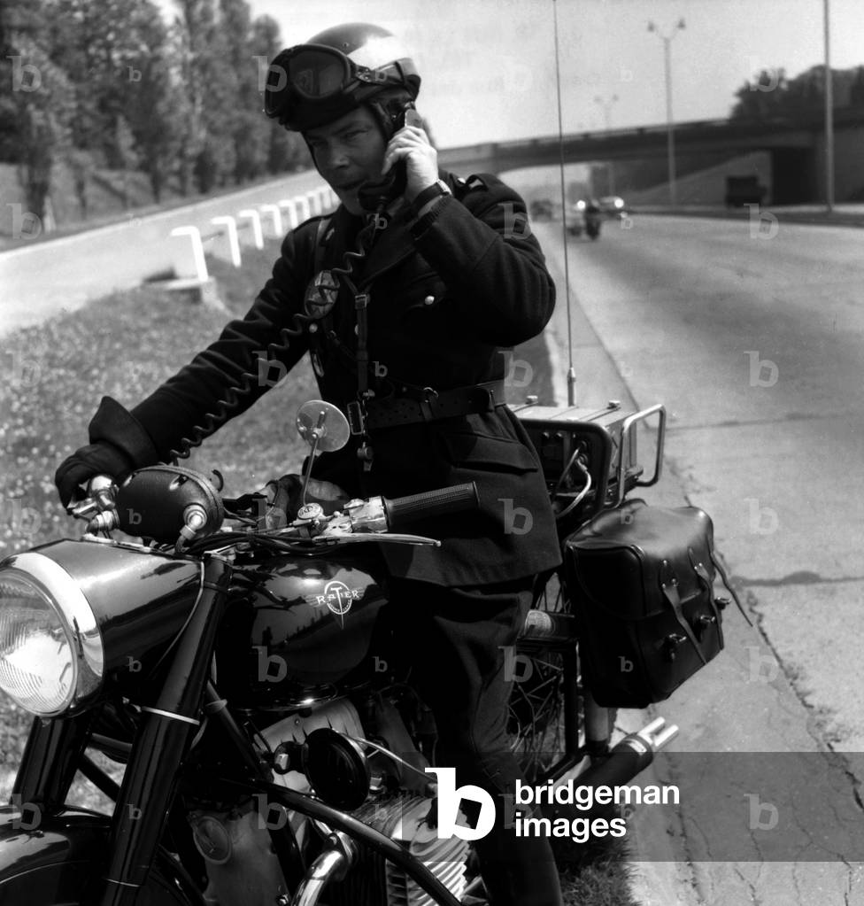To Fight Against Reckless Driver and Road Accidents, Police Motorcyclists Have Individual Radio Set, August 2, 1957 (b/w photo)