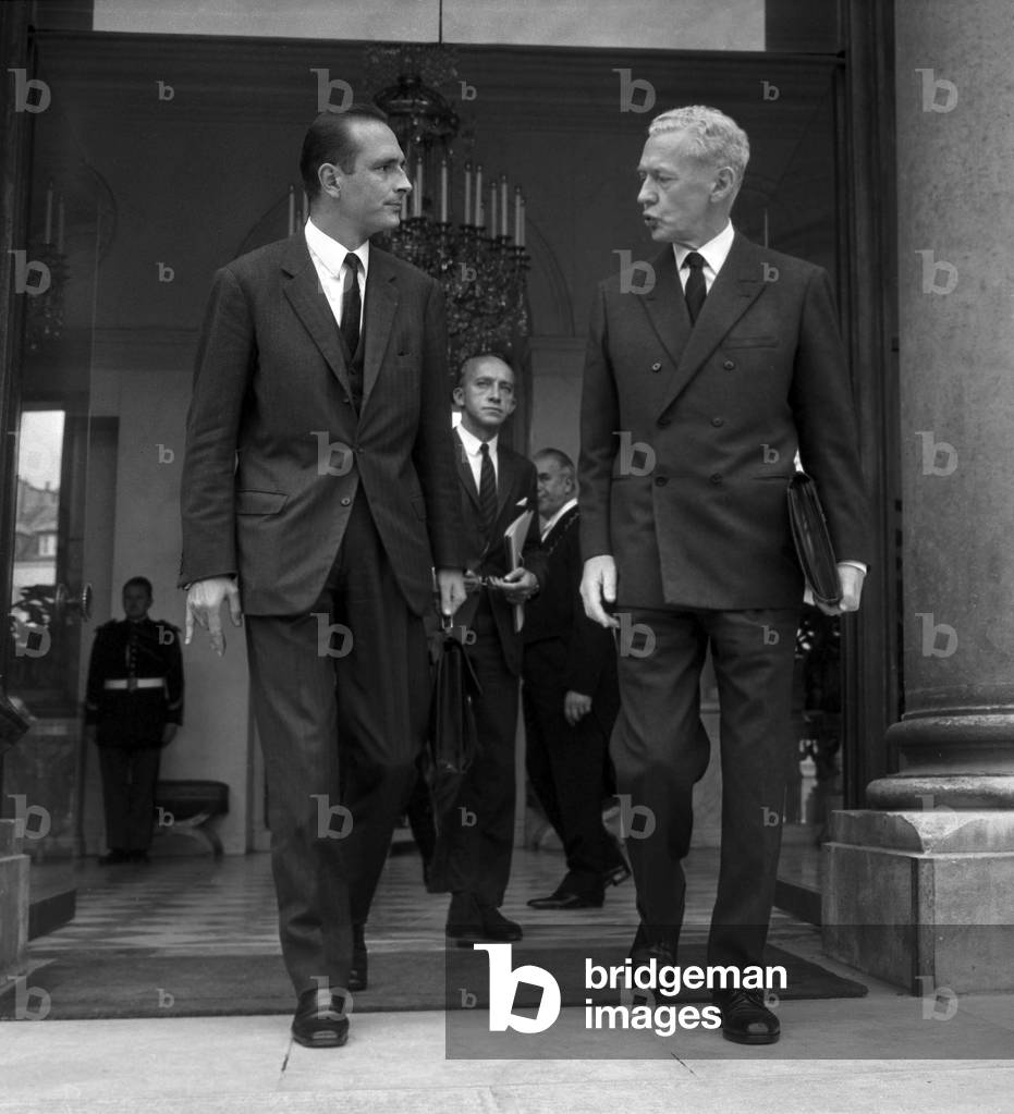 French Prime Minister Maurice Couve De Murville (R) and Jacques Chirac Estate Secretary of Economy and Finances Leaving Elysee Palace After Ministers Counsil September 25, 1968 (b/w photo)
