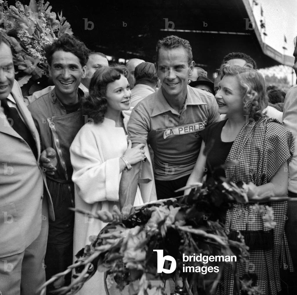 Arrival of Tour De France, July 29, 1951 in Paris : Cyclist Hugo Koblet, Winner, With Line Renaud and Francoise Arnoul (b/w photo)