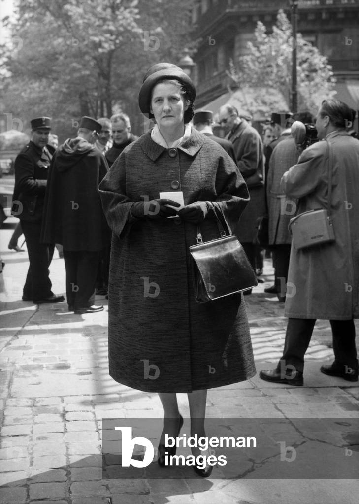 Madame La Marechale De Lattre Arriving At The Palace Of Justice Cited As A Temoin For The Trial Of The Ex General Salan, Proces That led to Perpetuite Conviction For Her Participation In The Putsch Of Algiers Before The High Military Court May 15, 1962 (b/w photo)