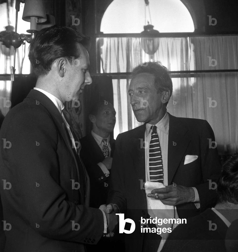 Prix du Palais Royal (poetry prize), Paris, June 22, 1949 : French writer Louis Le Cunff (winner) and Jean Cocteau, member of the jury (b/w photo)