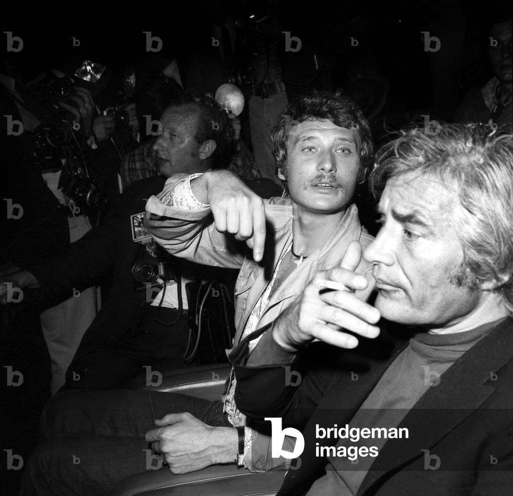 Johnny Hallyday and Paul Gegauff at Premiere of Film 