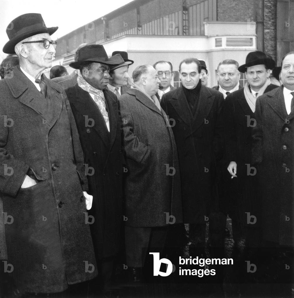Head of French Government Guy Mollet Is Going in Algeria To Meet General Catroux Resident Minister in Algeria here Members of his Government Saying Goodbye To Mollet : Felix Houphouet Boigny Minister Delegate To The Prime Minister , Pierre Mendes-France , Maurice Bourges Maumouny and Robert Lacoste (Resident Minister in Algeria) February 6, 1956 during War in Algeria (b/w photo)