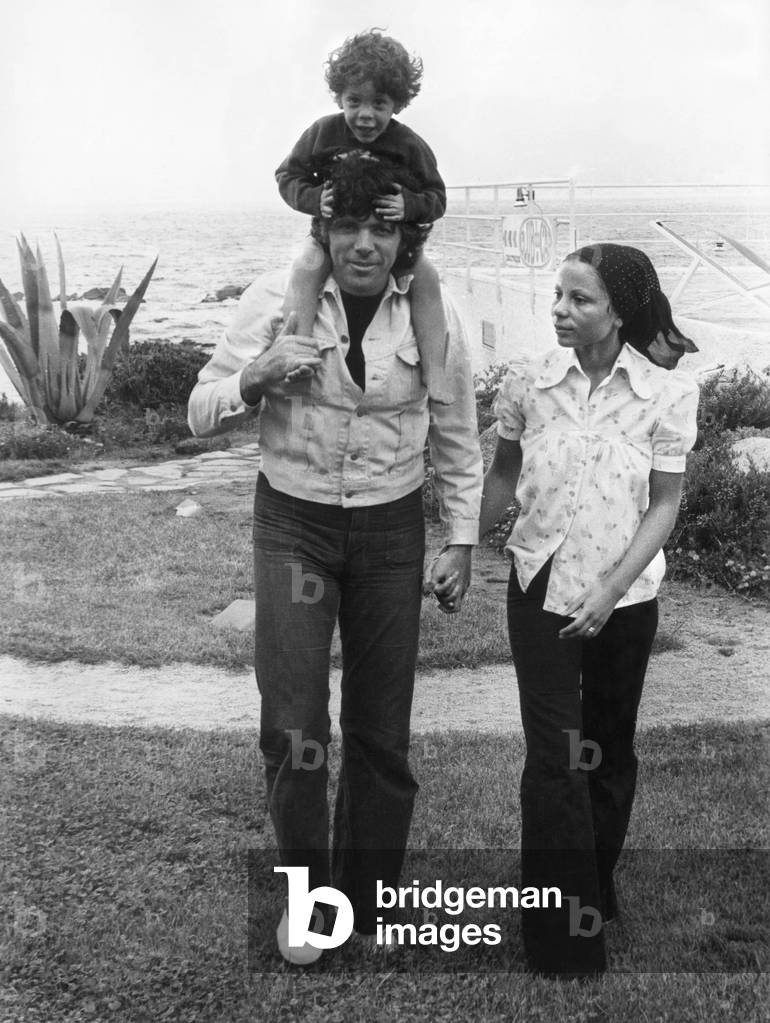 French Singer Pierre Barouh, his Wife Dominique and Their Son Benjamin on Holidays in Corsica on May 15, 1972 (b/w photo)