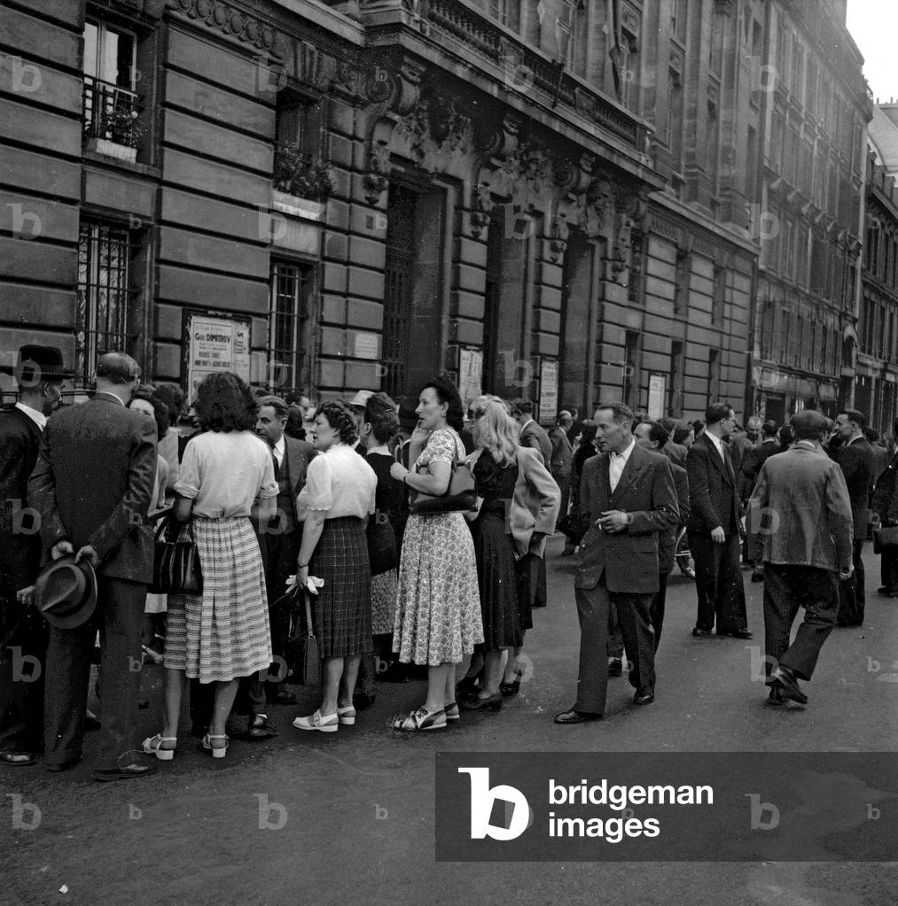 Meeting of the employees of department stores in Paris outside the Labour counil, Paris, July 4, 1949 (b/w photo)