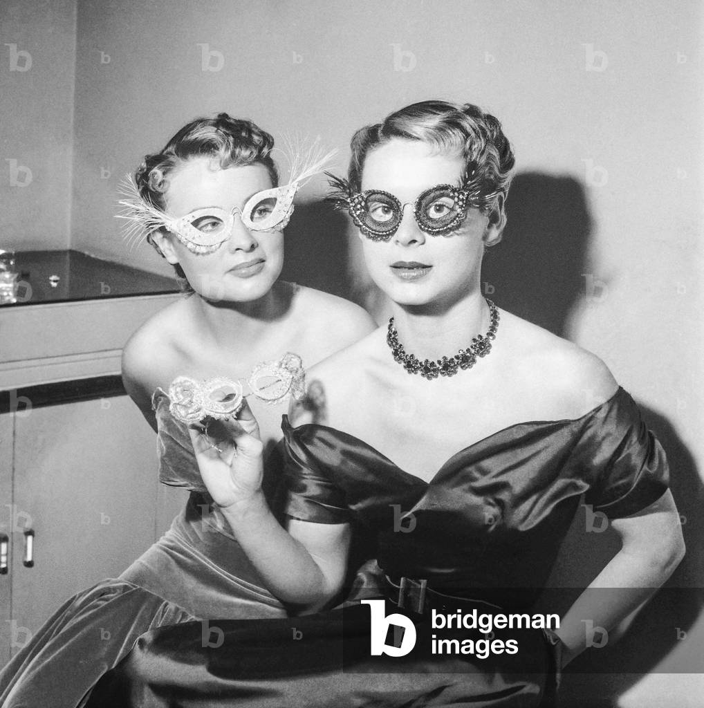 Evening glasses created by French hairdressers Pierre and Rene (lace, fabric, gems), Paris, January 20, 1951 (b/w photo)