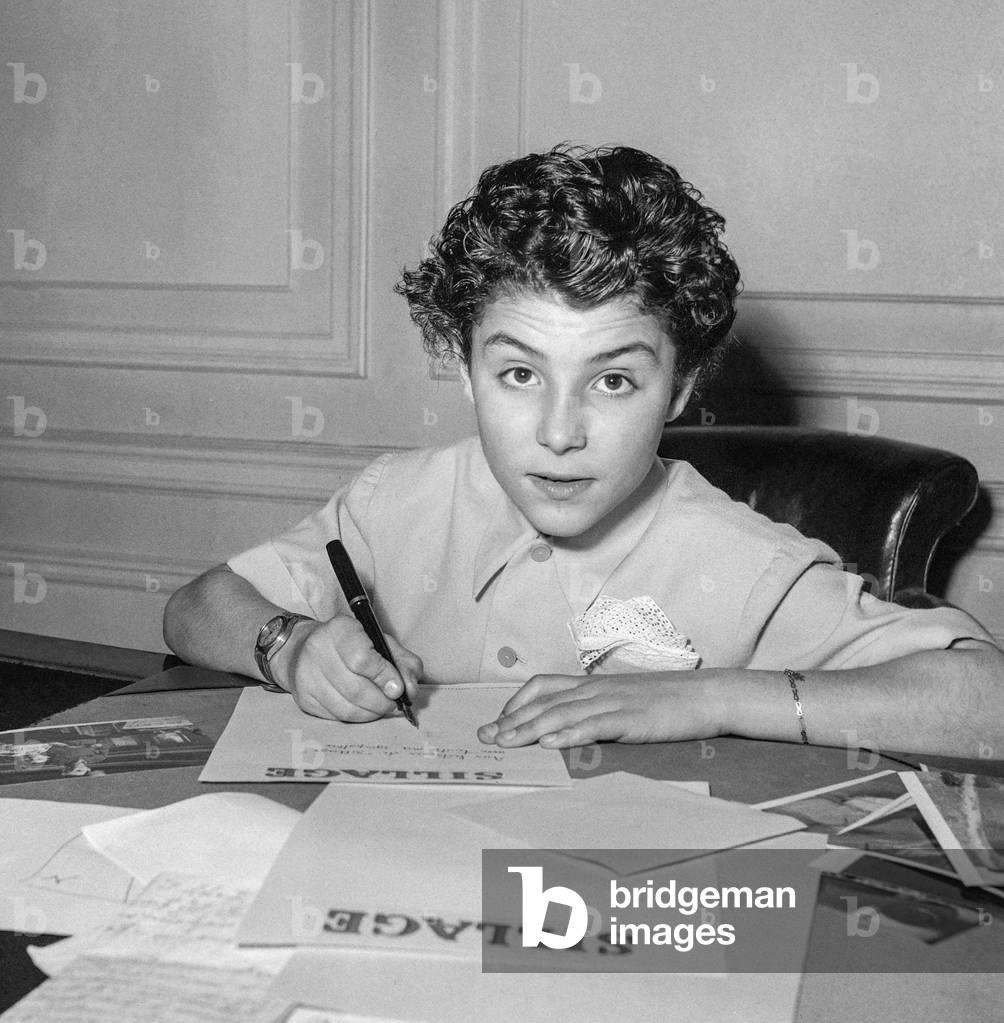 The young musical prodigy Roberto Benzi, June 1950 (b/w photo)