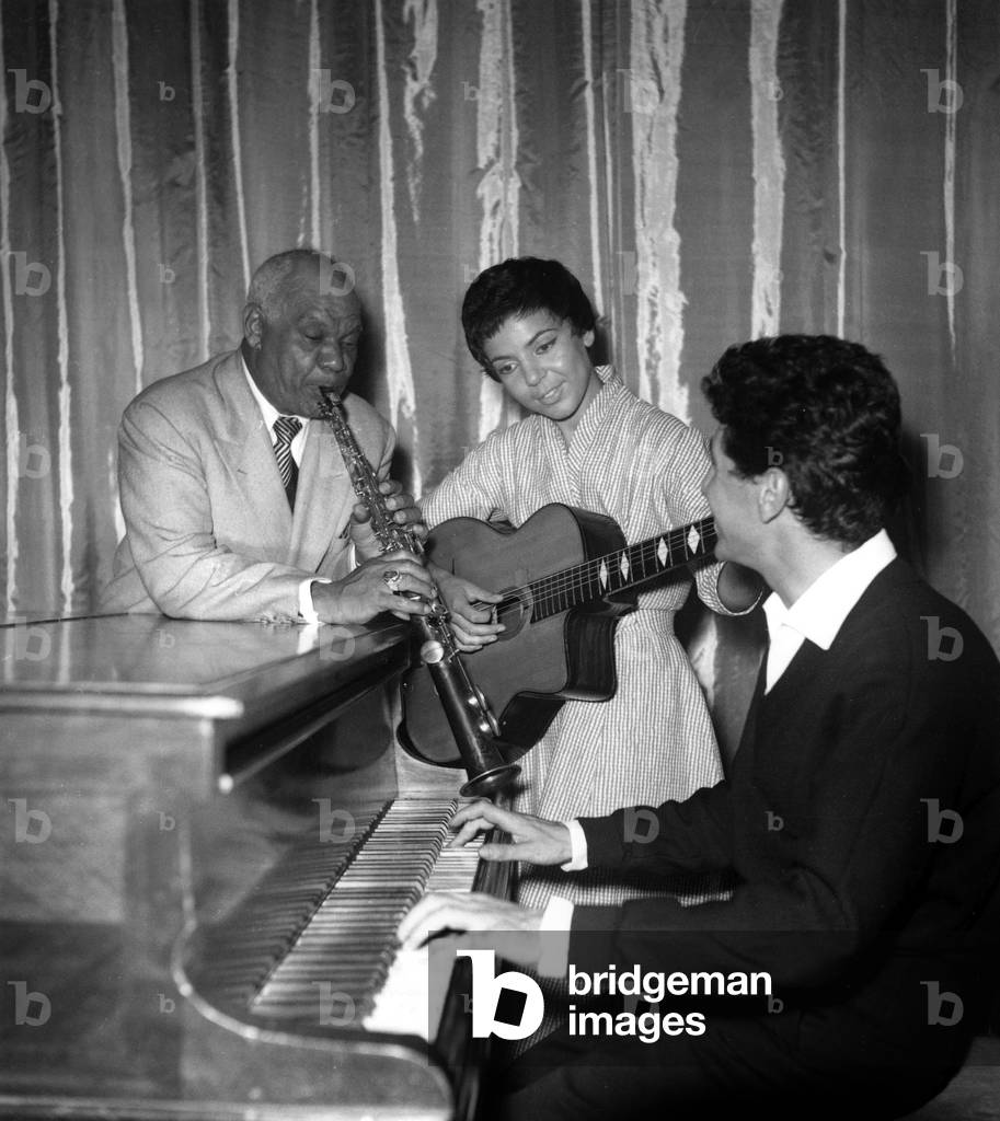 L-R Sydney Bechet, Nicole Louvier and Marcel Mouloudji Improvising A Trio After Concerts at Olympia Where They Perform Simultaneously, Le 8 Septembre 1954 (b/w photo)