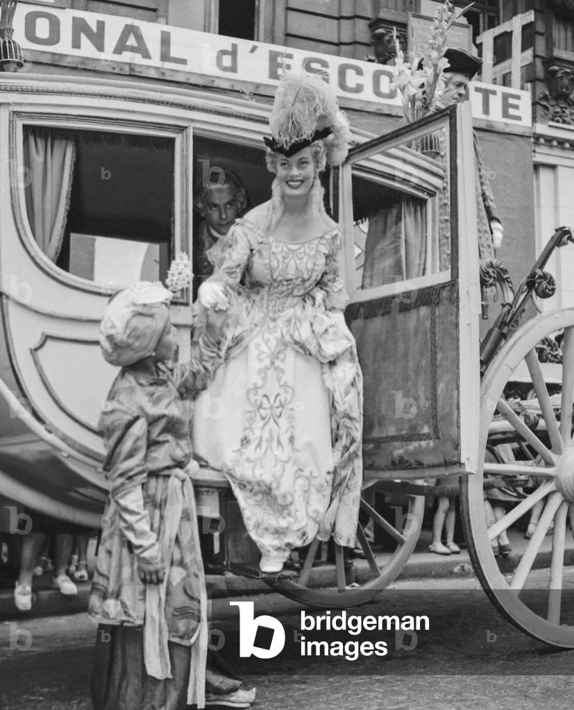 Historical parade in Paris (people wearing 18th century clothes), June 22, 1951 : French actress Suzy Carrier as the Princess of Conti (b/w photo)