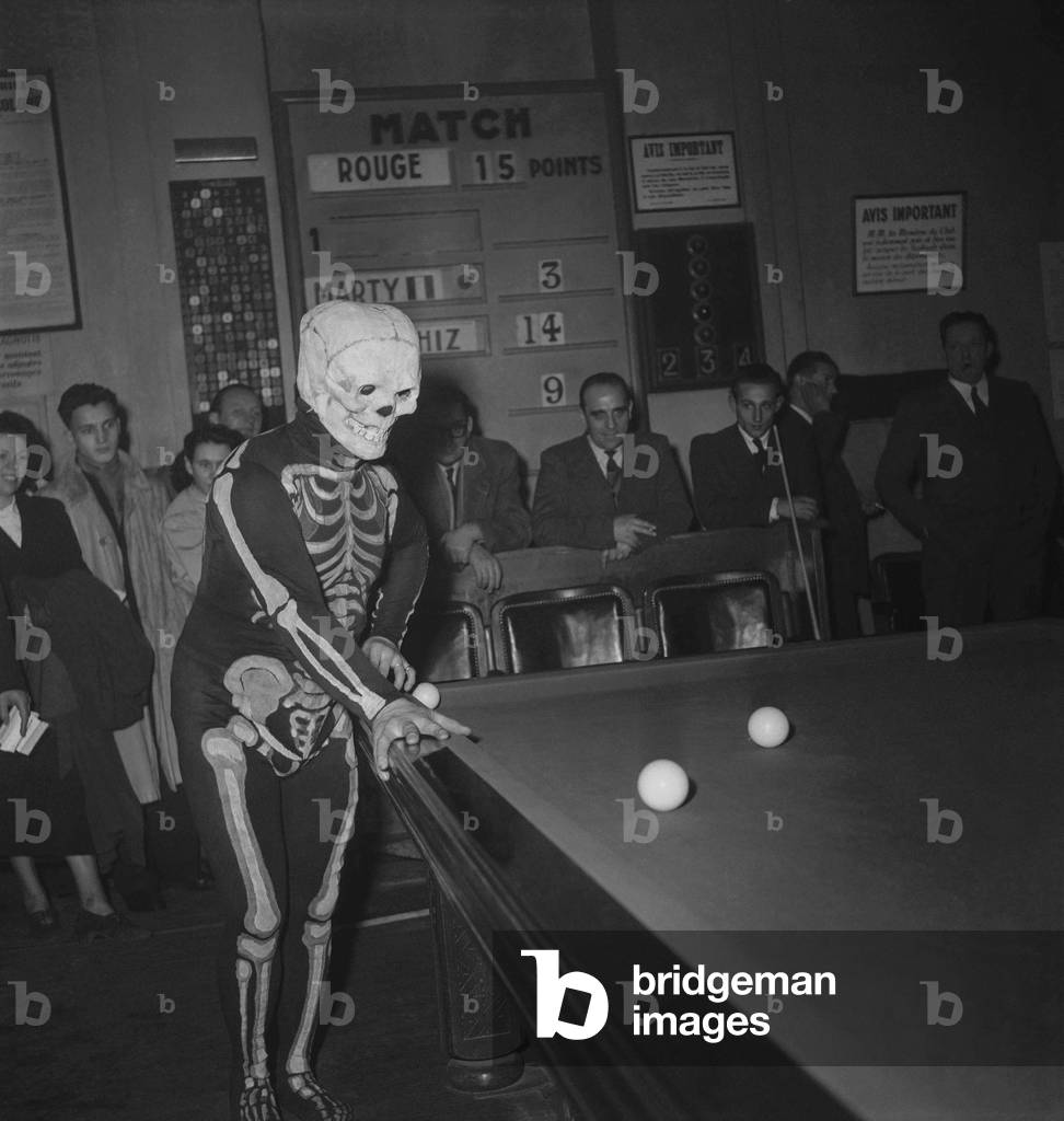 Antoine Boris, billiards player dressed as a skeleton, Paris, December 17, 1949 (b/w photo)