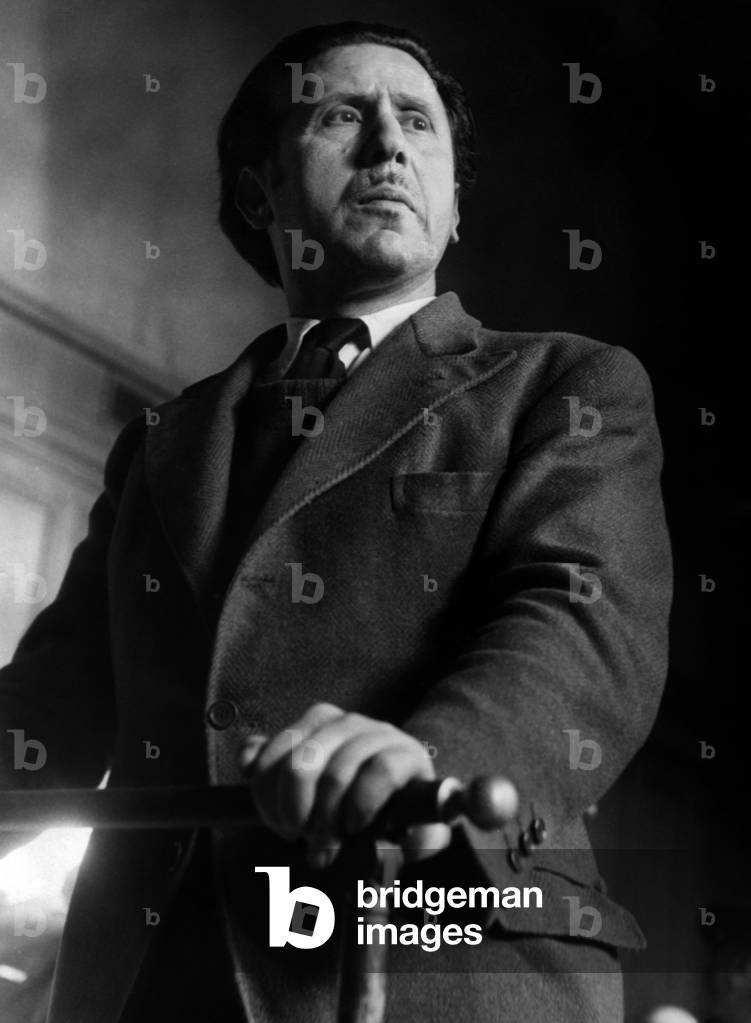 Ernest Lupescu Who Was An Office Boy In A German Purchasing Office For 7 Days Who Was Sentenced To Force Work In Perpetuite On November 20, 1945 By The Court Of Justice Here Appearing At The Bar Of The Temoins In The Dupleix-Colletta Trial On February 24, 1948 (b/w photo)