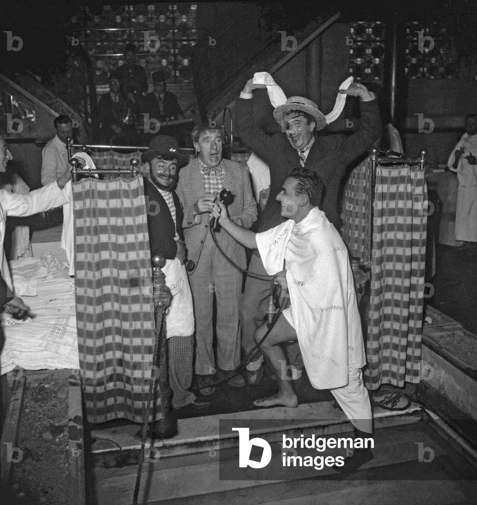 The Pieds Nickeles (Ribouldingue/Maurice Baquet, Filochard/Jean Paredes et Croquignol/Rellys) at the hammam in Paris on October 25, 1949 on set of film 