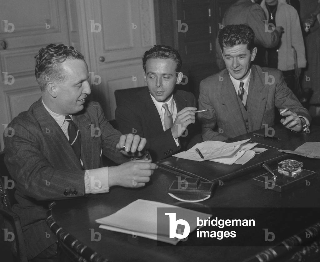 Jacques Laurent (Cecil Saint Laurent, c) on December 8, 1949 in Paris signing contract with producers Francois Chavane and Alain Poire for the film from his book 