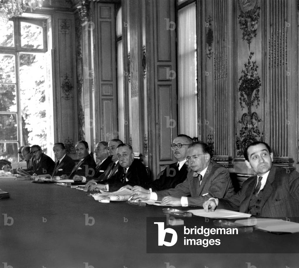 Charles Lussy, Guy Mollet, Jules Moch, Edouard Barrachin, Antoine Pinay, Georges Bidault, Rene Mayer, Henri Queille, Rene Pleven, Edgar Faure, Pierre Mendes-France during Special Meeting at Matignon Hotel on The Call of French President Vincentauriol of All Former French Prime Ministers and Political Leaders during Ministerial Crisis June 20, 1953 (b/w photo)