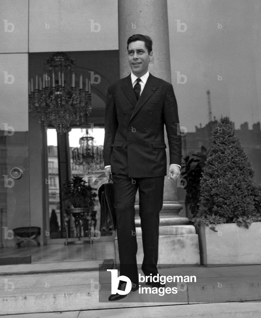 Yves Guena, French telecommunications Minister, leaving the Elysee in Paris after Council of Ministers, June 15, 1967 (b/w photo)