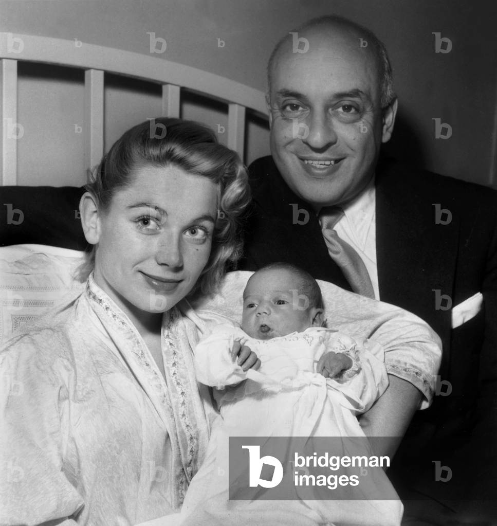 Ray Ventura With his Wife Jacqueline Lemoine After The Birth of Their Daughter Carole November 12, 1953 (b/w photo)