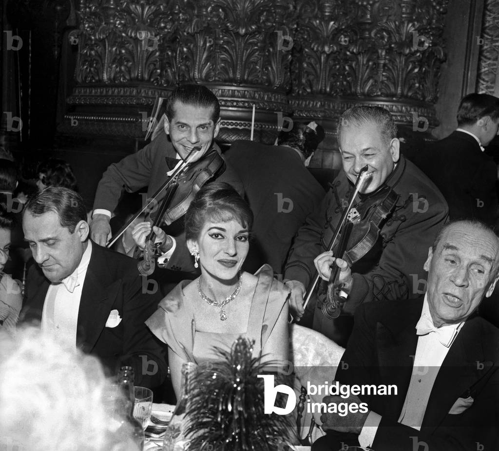 Maria Callas (With Jewels By Van Cleef Et Arpel) With Herve Mille (L) and Jean Pruvost (R) during Diner For The Legion of Honours Charities at The Opera in Paris December 20, 1958 (b/w photo)