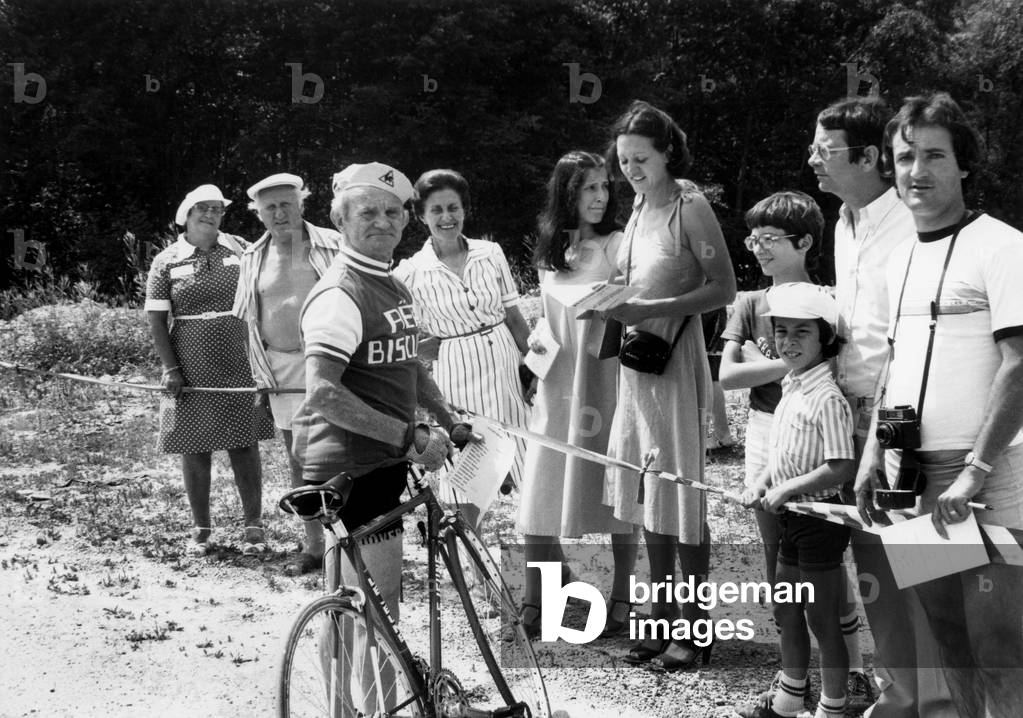 Cyclist Jean Robic Former Tour De France Winner Here apprehends to take the start at the Picturesque Annual Cycling Challenge with Former Champions of Bike and Ski On July 2, 1979 At Praz Sur Arly Station (b/w photo)