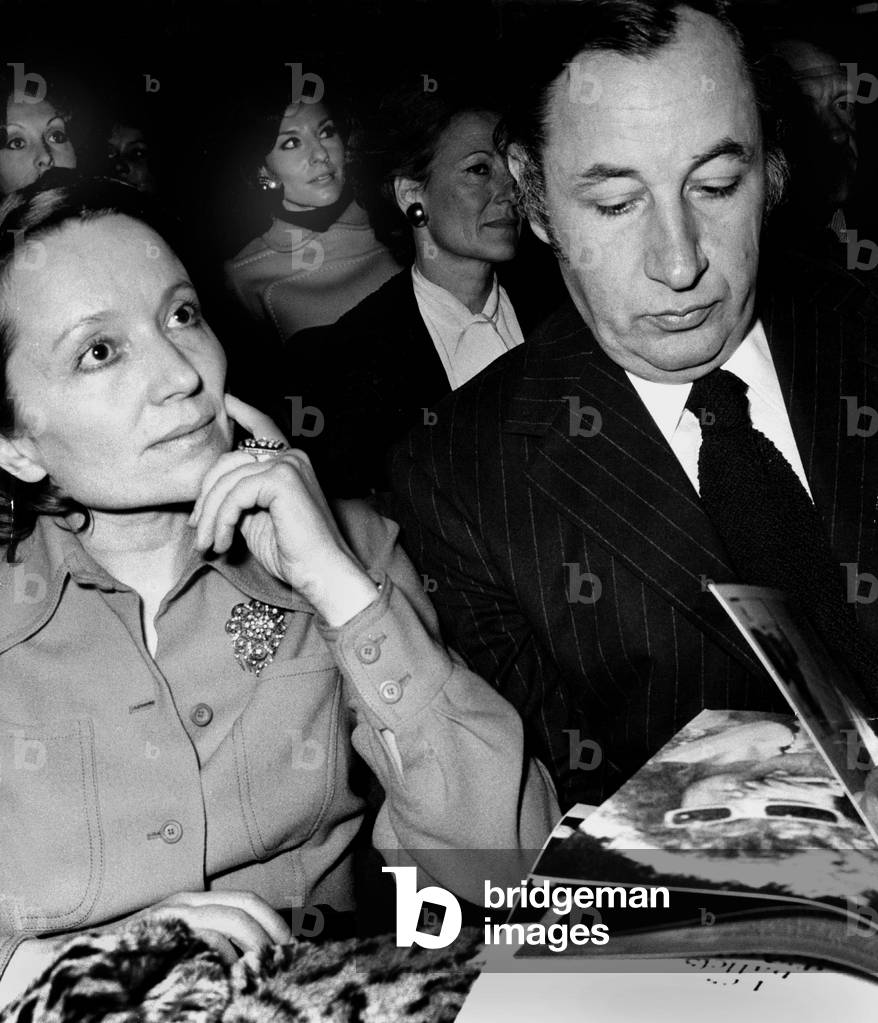 French Actor Philippe Noiret and his Wife Monique Chaumette at Premiere of Michelpolnareff at The Michelpolnareff in Paris on March 28, 1973 (b/w photo)