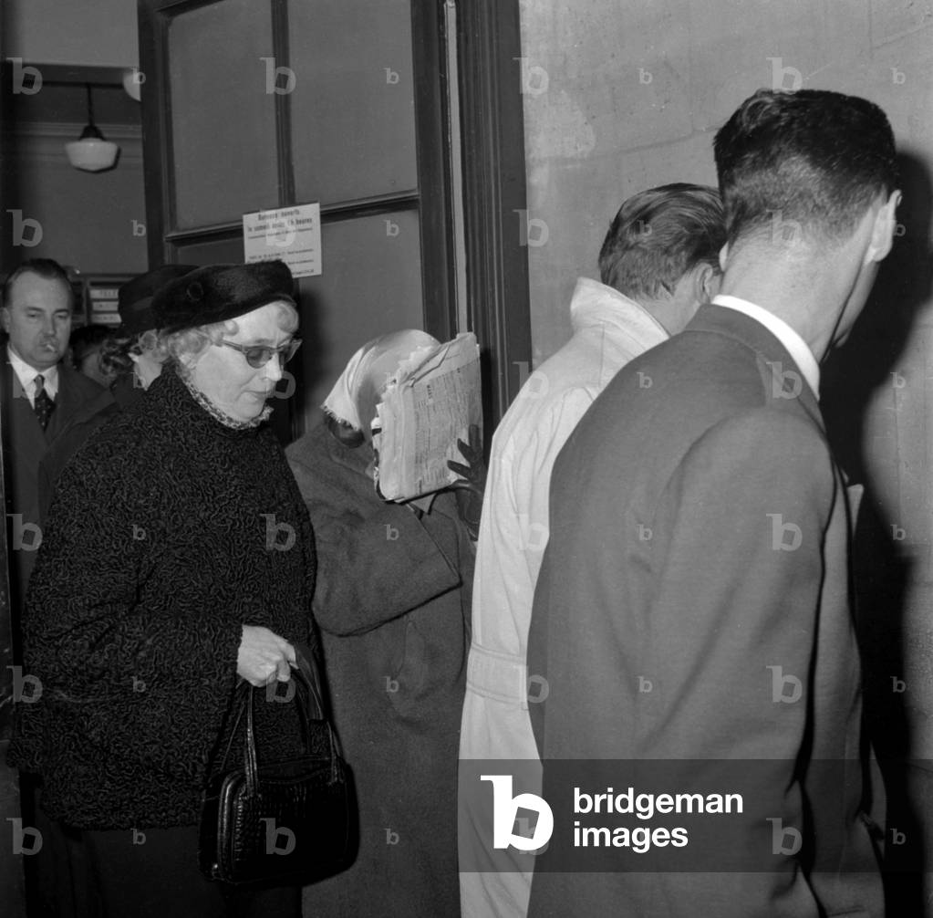 Trial of Georges Rapin (Murderer of Muguette Thirel Aka Dominique Or Domino) in Paris on March 29, 1960 : Nadine Levesque (Rapin'S Fiancee) Hiding her Face, and Rapin'S Parents (b/w photo)
