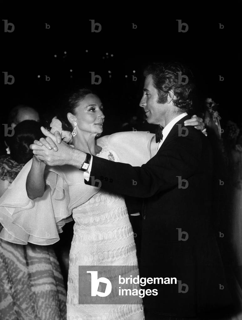 Jacqueline Viscountess of Ribes dancing with Jacques Chazot during a gala at Cercle Interallie in Paris on July 3, 1972 (b/w photo)