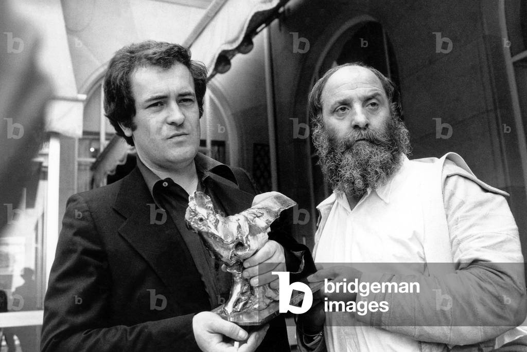 Bernardo Bertolucci Receiving Raoul Levy Prize From French Sculptor Cesar For his Film L' Ultimo Tango in Parigi May 4, 1973 (b/w photo)