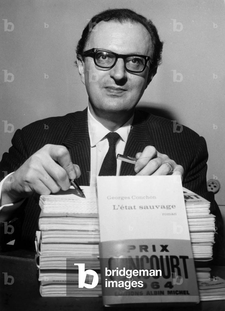 The French Writer Georges Conchon,Sign his Book 