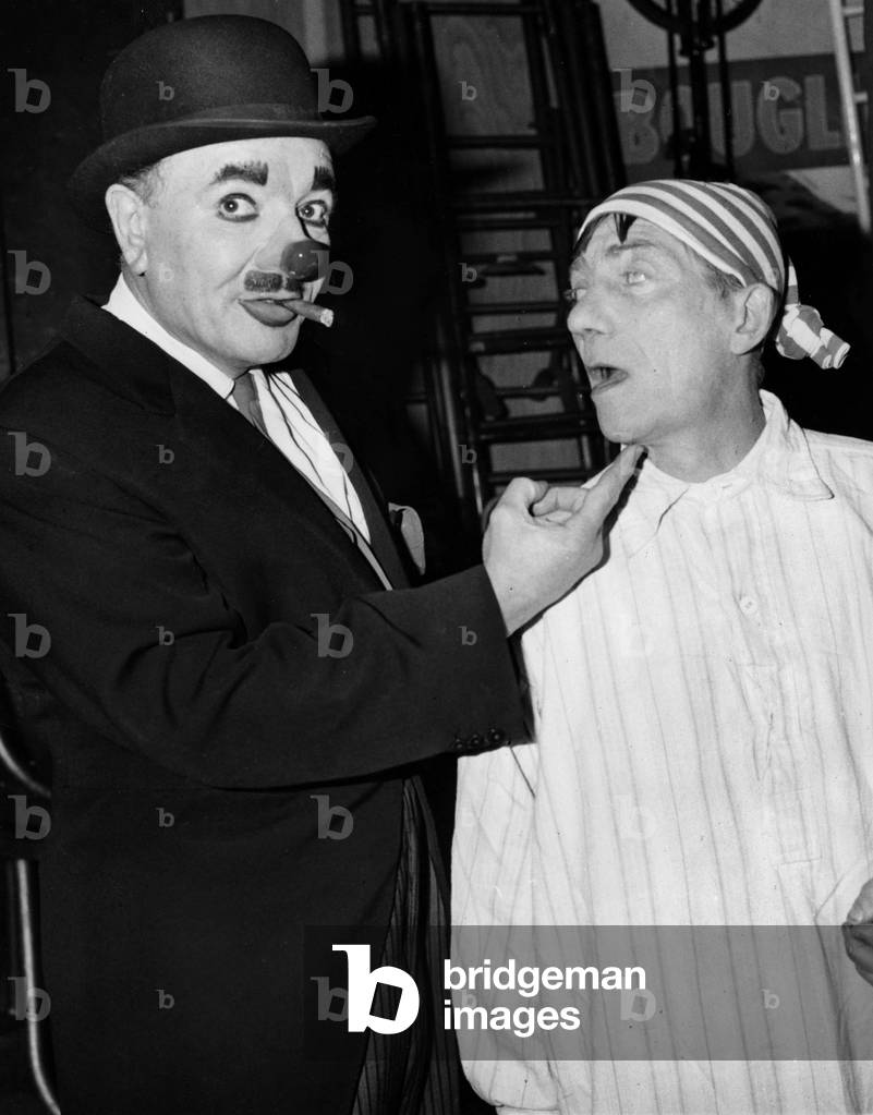 Clowns Charlie Cairoli Left And Jimmy Buchanan At The Circus D Winter Track Gala November 17, 1966 (b/w photo)