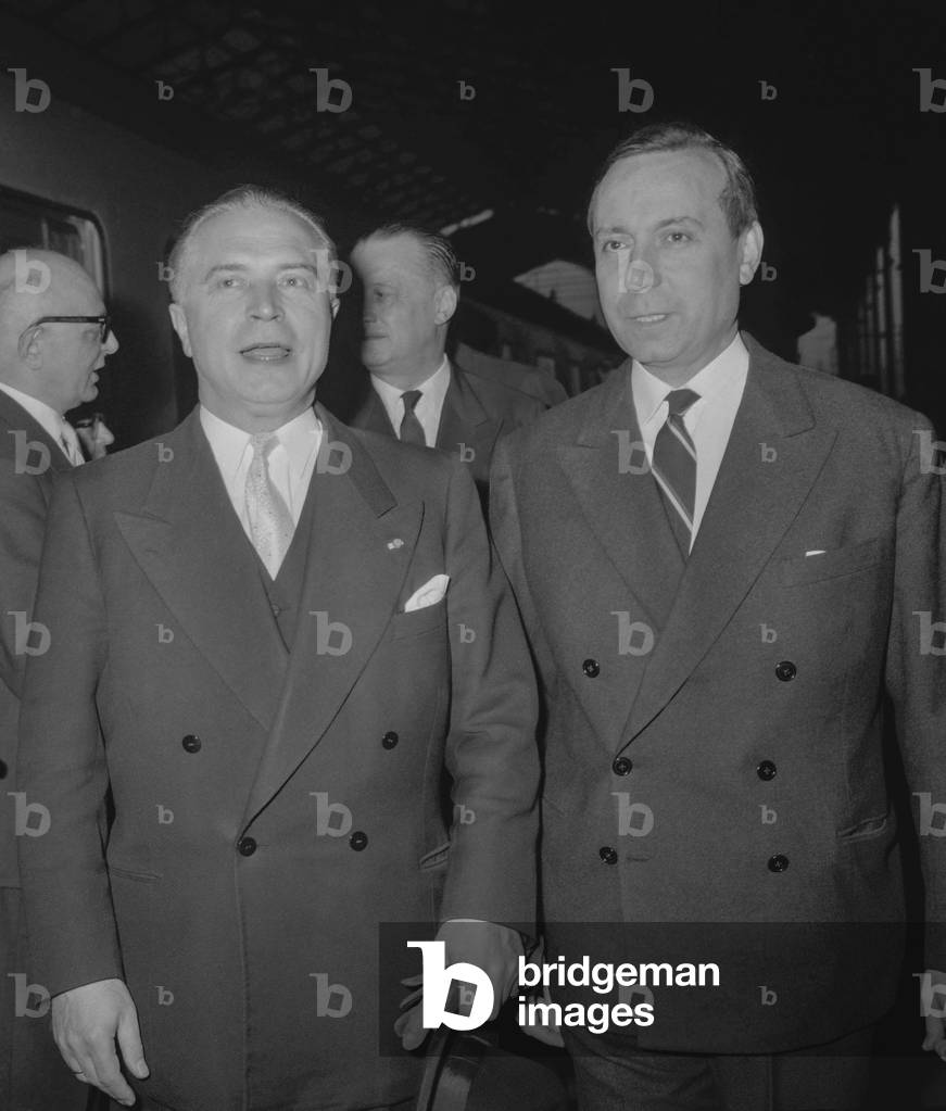 Gaston Eyskens, Belgian prime minister, welcome at Paris station by Michel Debre, September 13, 1960 (b/w photo)