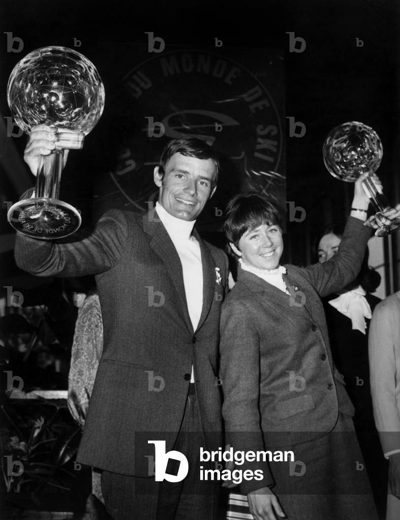 The World Champion of Alpine Skiing, Jean-Claude Kelly and Nancy Greene Brandishing Their Cup, Evian, May 7, 1968 (b/w photo)