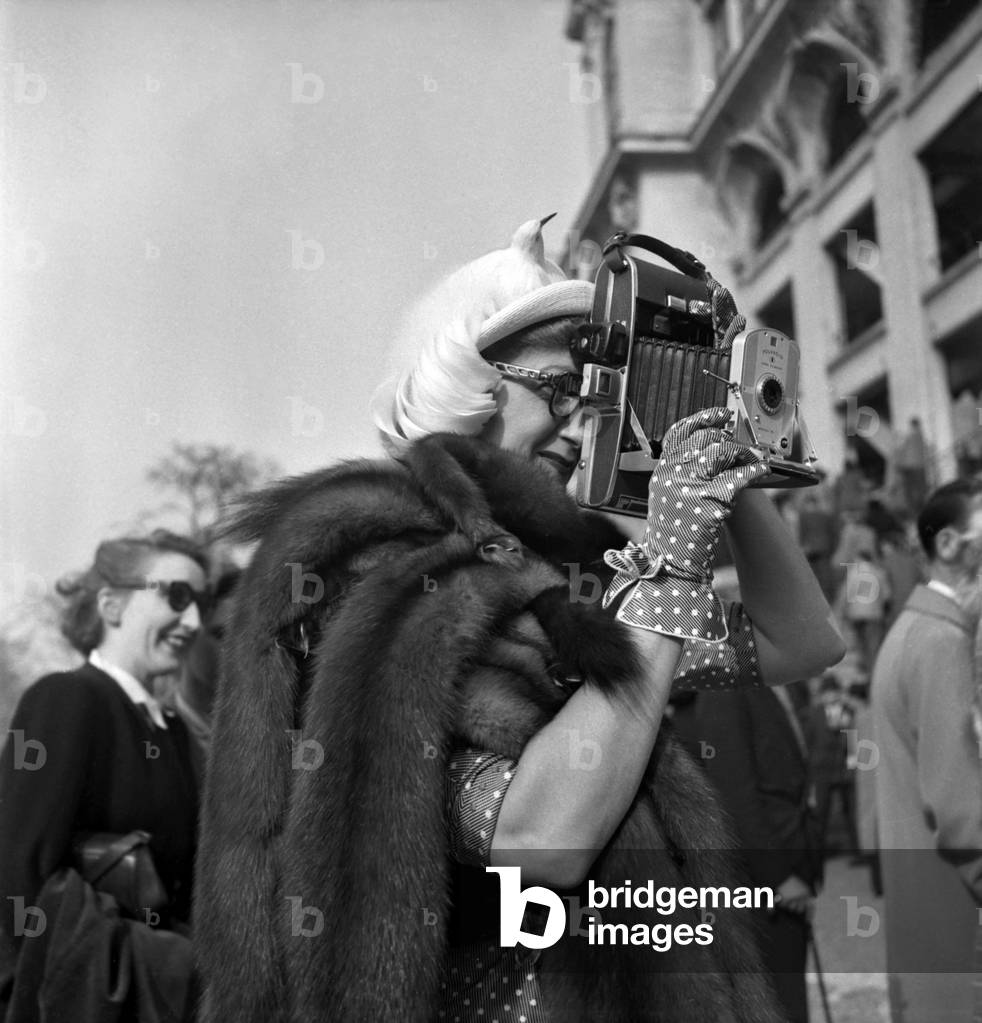 Fashion in Longchamp, Paris, March 10, 1949 : Elegant Woman (b/w photo)