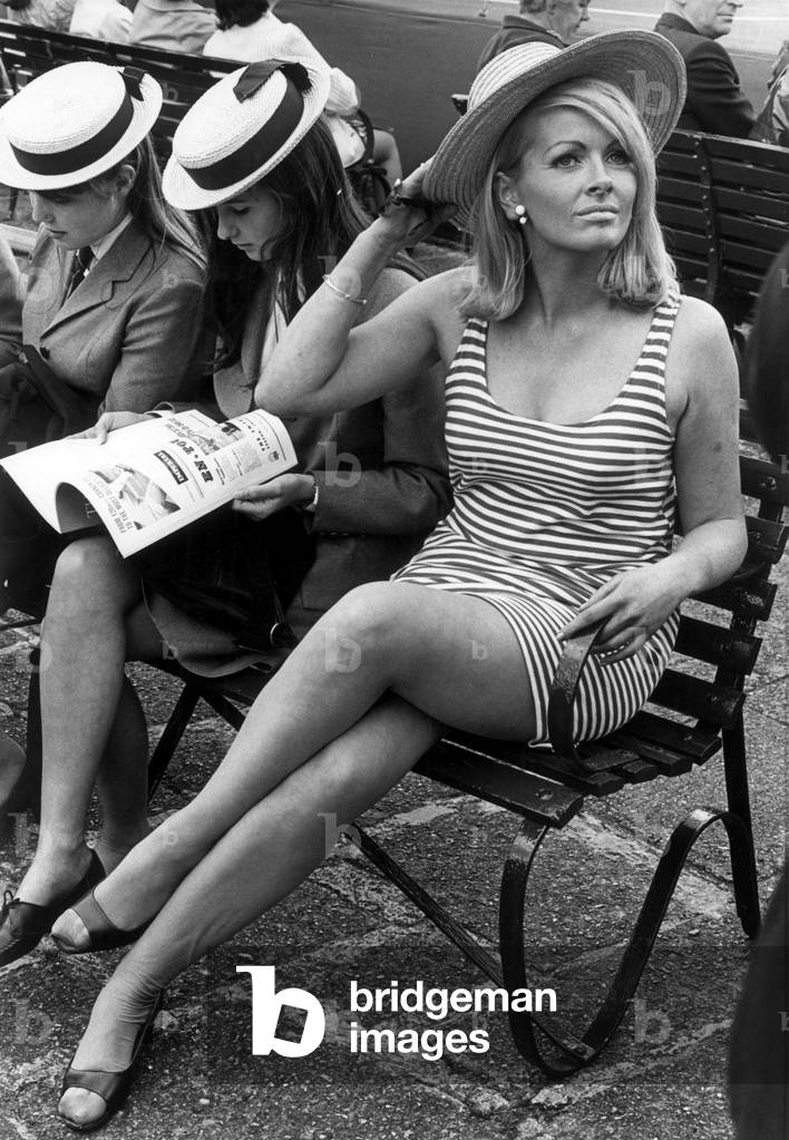 Actress Pauline Raynsford Joins The School With Straw Boater In Wimbledon For Manuelsantana Tennis Match Against Charlespasarell June 27, 1967 (b/w photo)