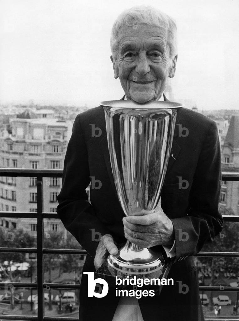 French Photographer Jacques-Henri Lartigue Coming From Receiving The Golden Cup Of Good Gout French. September 24, 1985 (b/w photo)