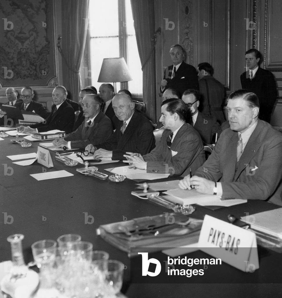 L-R German Chancellor Konrad Adenauer, Robert Schuman French Minister of Foreign Affairs, Jean Monnet during The Conference About The Schuman Plan June 20, 1951 , Beginning of Project of European Union (b/w photo)