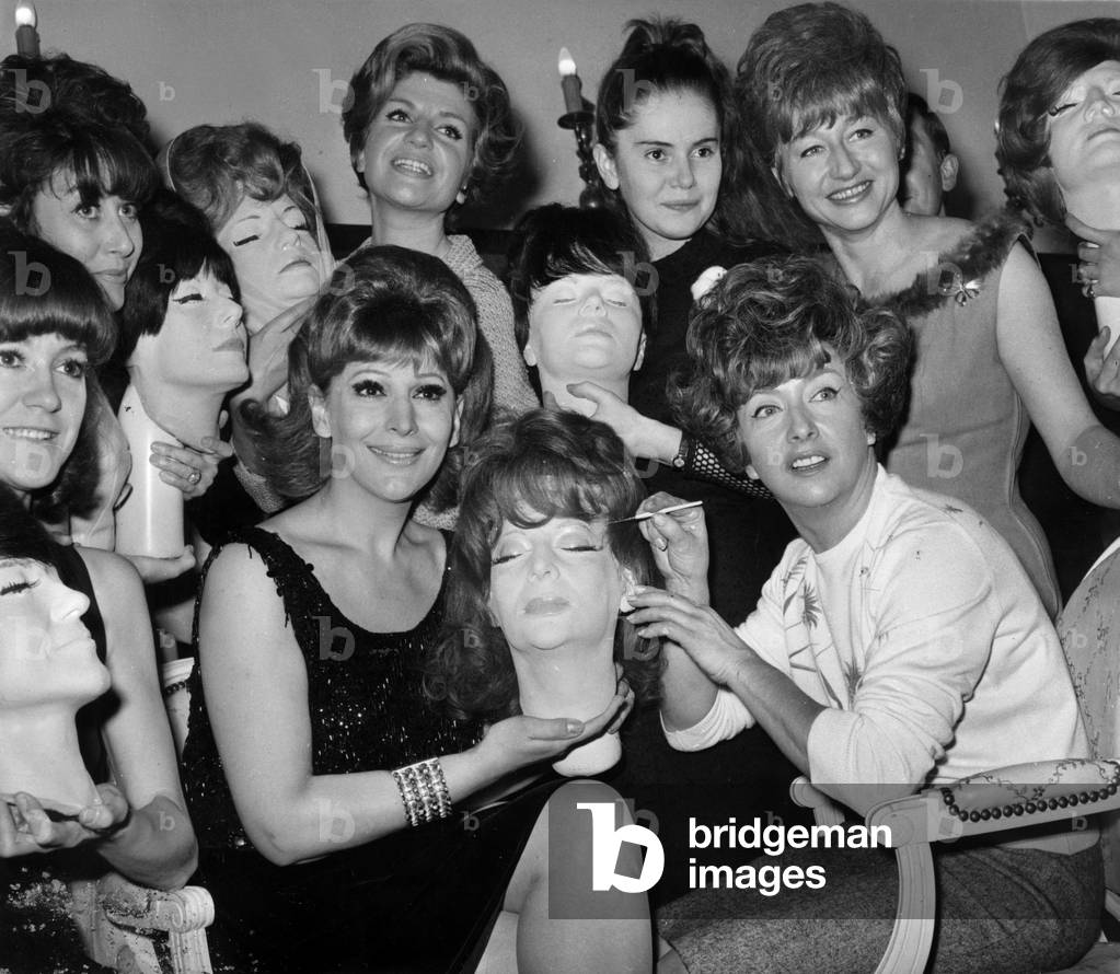 Franca Duval (C) and at her Right Mick Micheyl, and at Middle Distance L-R Alice Dona, Genevieve De Villmorin, Francoise Dorin, Minou Drouet and Paola, November 29, 1965 (b/w photo)