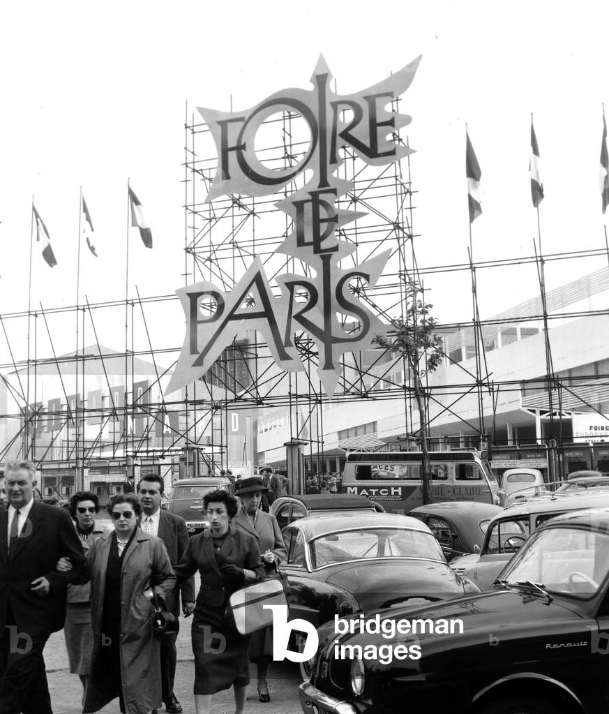 Visitors Going To The Paris Fair May 25, 1957 (b/w photo)