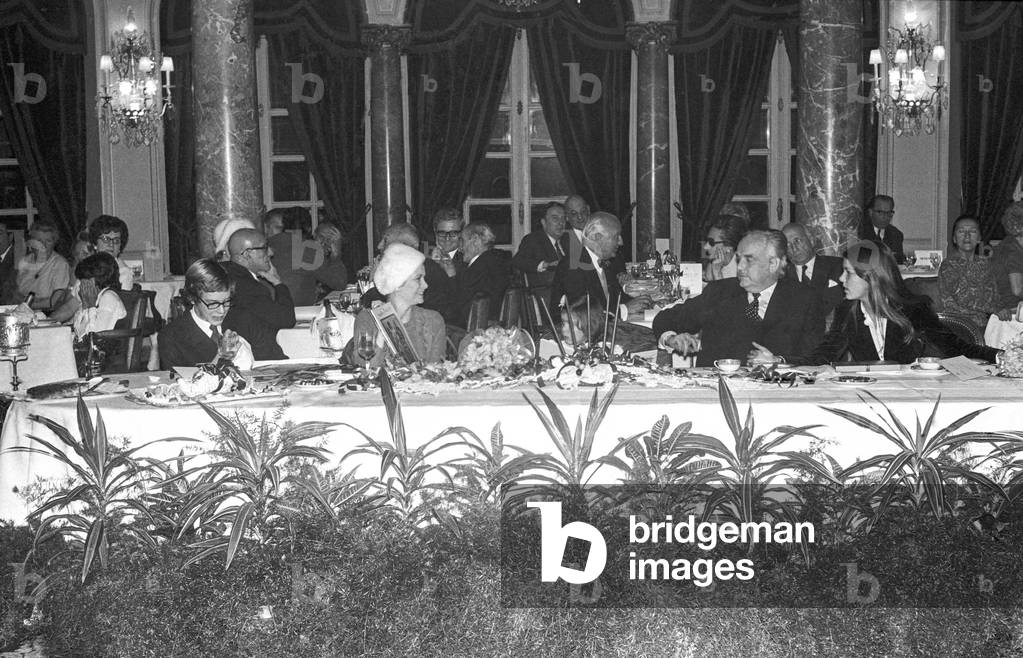 Christmas for the police of Monaco, December 22, 1971 : Prince Albert (future Albert II), Princess Grace, Princess Stephanie, Prince Rainier III of Monaco and Princess Caroline (b/w photo)