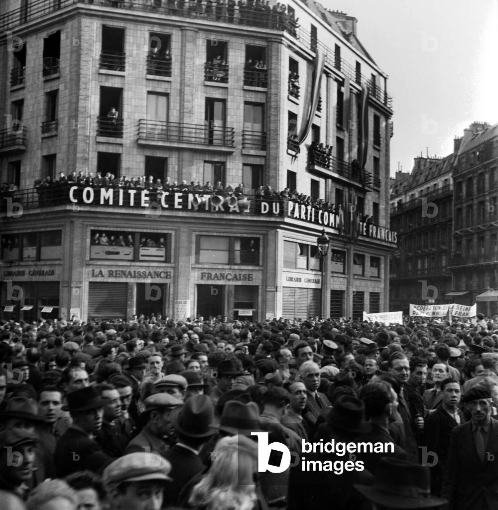 Demonstration Outside The Head Office of The French Communiste Party in Paris, February 20, 1946 (b/w photo)