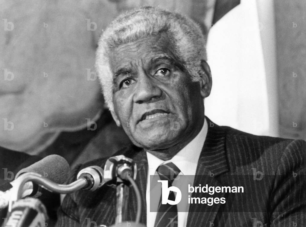 Dick Ukeiwe President of the Caledonian Territorial Government at a Press Conference in a Senate Room in Paris January 30, 1985 (b/w photo)