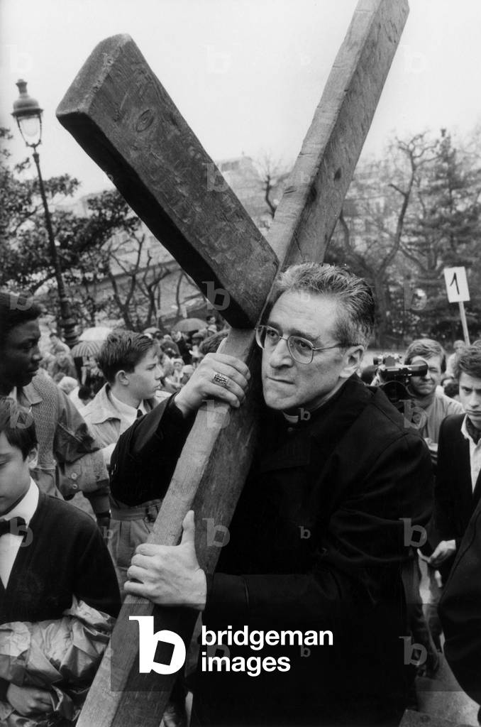 The Stations of The Cross in Montmartre, Paris : French Cardinal Jean-Marie Lustiger, Archbishop of Paris, Holding The Cross April 5, 1985 (b/w photo)