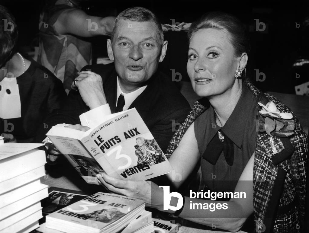 French Writer Jean Jacques Gautier and Michele Morgan at The Book Sale of Veteran Writers in Paris April 24, 1968 (b/w photo)