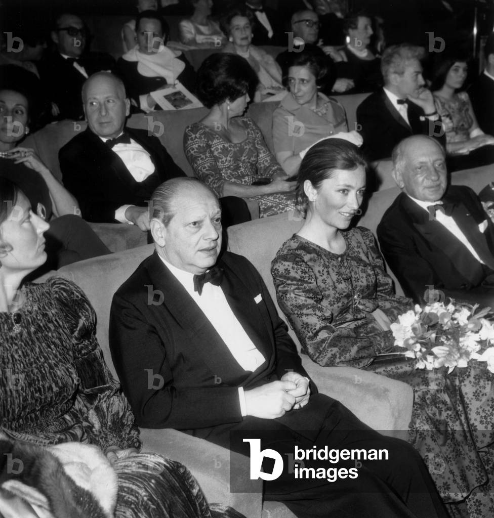In Paris, April 29, 1970 : Belgian Charity Gala : Robert De Rothschild, Princess Paola of Belgium, Baron Edouard Jean Empain ; 2Nd Row : Walter Eytan (L) Israeli Ambassador (b/w photo)